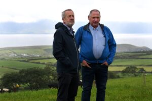 Seán Kelly with Dinny Galvin on his land near Lispole, overlooking Dingle Bay