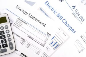 Graphic of generic energy bills: energy statement, electric and gas